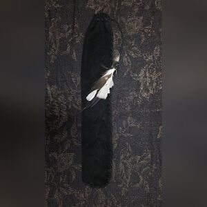 Handmade Black Drawstring Suede Bag with White and Brown Feather Accents